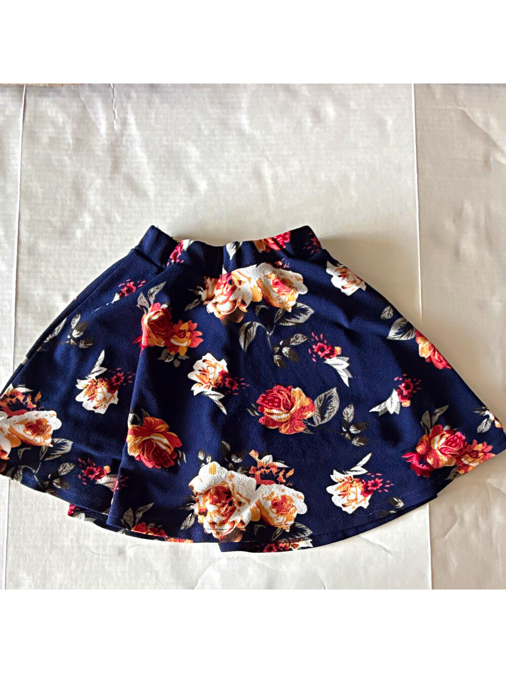 SHEIN Women's XS Blue Floral Skater Mini Skirt Pleated Knit Pull On Elastic